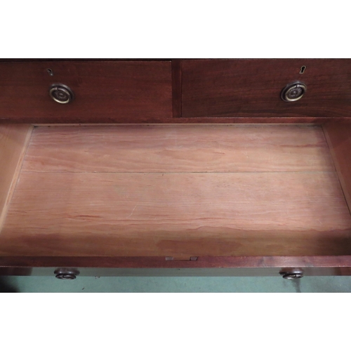 4134 - A 19th Century flame mahogany chest of two short over three graduating long drawers on bracket feet,... 