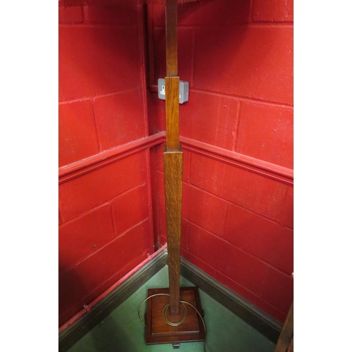 4135 - An Art Deco oak standard lamp on graduating square tapering column and stepped square base with shad... 