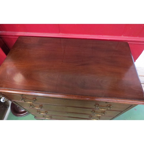 4147 - An early 19th Century flame mahogany bachelors chest, the fret lined brushing slide over four gradua... 