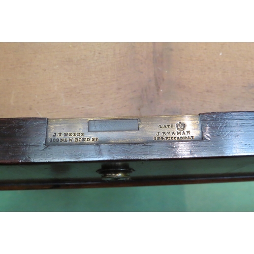 4154 - A rosewood round cornered chamfered edge top library table, the two frieze drawers with 