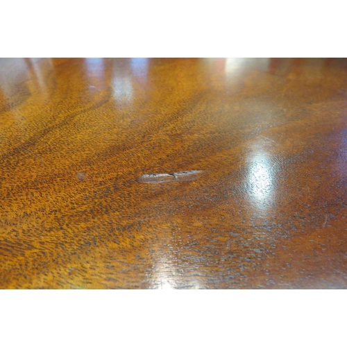 4155 - A 'Bevan and Funnell' crossbanded flame mahogany round corner occasional table on ring turned taperi... 