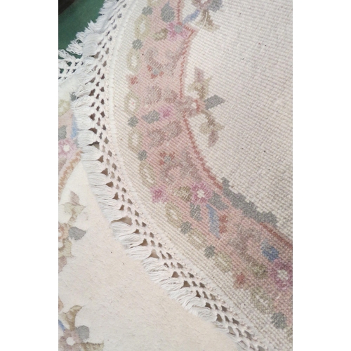 4171 - A peach ground Eastern wool rug, three central gulls and stepped border together with a chinese oval... 