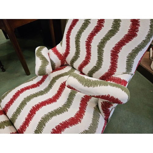 4158 - A French late 19th/early 20th Century reclining armchair with adjustable footstool and swivel arms