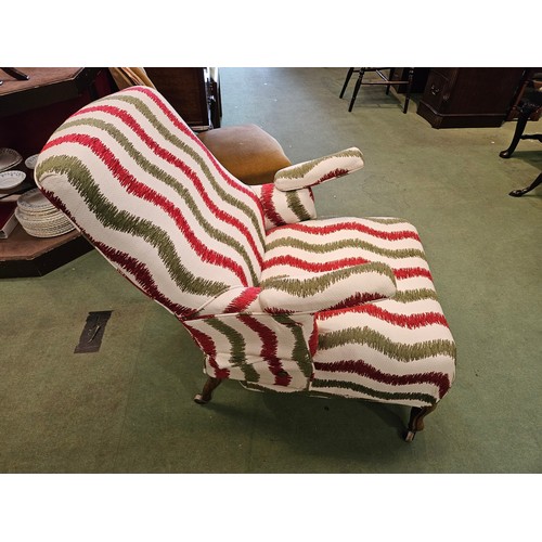 4158 - A French late 19th/early 20th Century reclining armchair with adjustable footstool and swivel arms