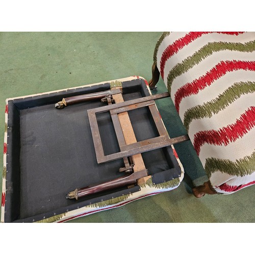 4158 - A French late 19th/early 20th Century reclining armchair with adjustable footstool and swivel arms