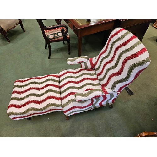 4158 - A French late 19th/early 20th Century reclining armchair with adjustable footstool and swivel arms