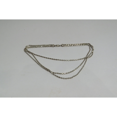 4301 - A silver bead link triple strand necklace.  Approximately 35g
