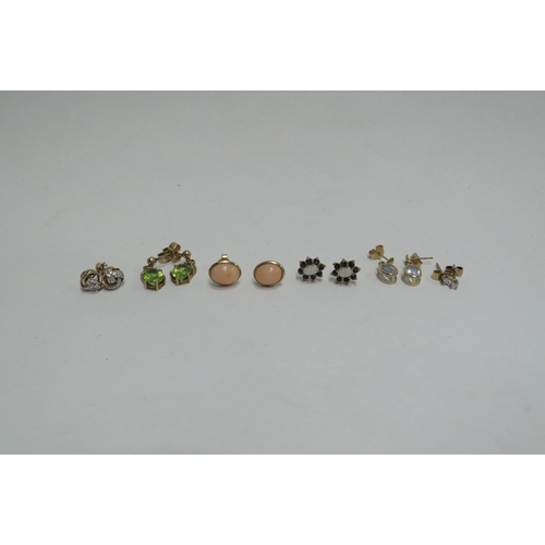 4302 - Six pairs of 9ct gold stone set earrings including opal, diamond, peridot, etc.  Approximately 8g