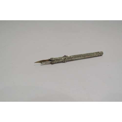4305 - A white metal combination propelling pencil and dip pen, florally engraved  (C)