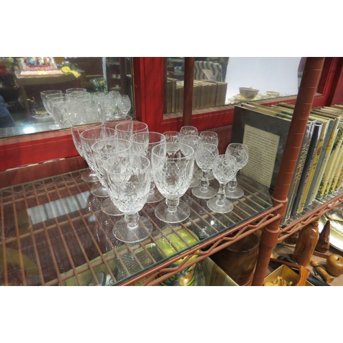4348 - Seven Waterford crystal cut glasses and one other together with a set of seven unbranded sherry glas... 
