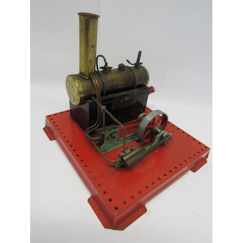 7382 - A Mamod live steam stationary engine, the horizontal brass boiler driving twin cylinders and flywhee... 