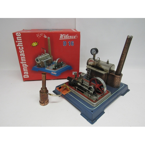 7381 - A Wilesco D16 Dampfmaschine live steam stationary engine plant, the horizontal boiler on brickwork e... 