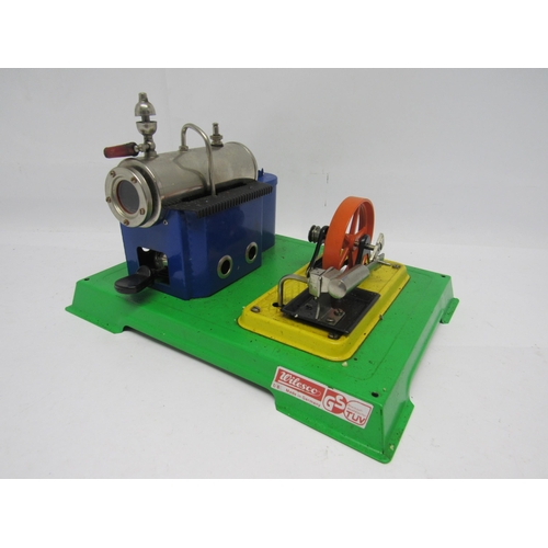 7376 - A Wilesco D8 live steam stationary engine plant, the horizontal boiler raised on blue tinplate plint... 