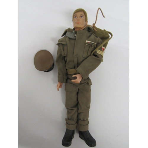 7218 - Three playworn vintage Palitoy Action Man figures with flocked hair, wearing an assortment of offici... 