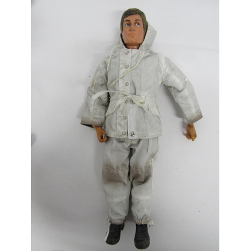 7218 - Three playworn vintage Palitoy Action Man figures with flocked hair, wearing an assortment of offici... 