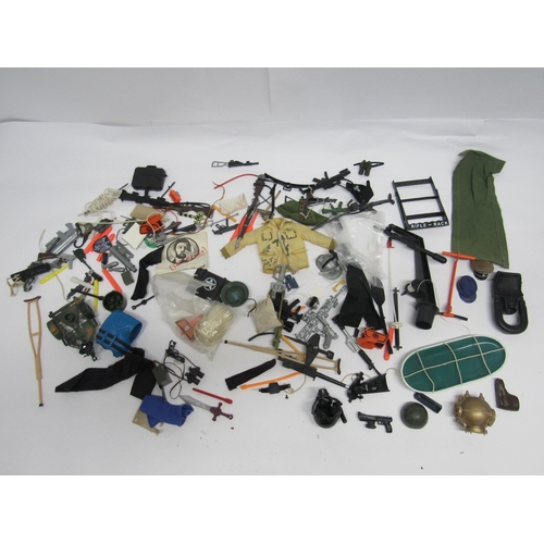 7219 - A box of playworn vintage and modern Action Man and similar accessories and weapons including Field ... 