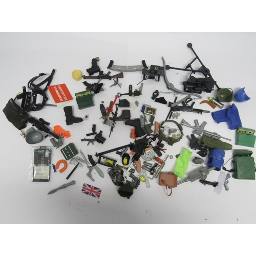 7219 - A box of playworn vintage and modern Action Man and similar accessories and weapons including Field ... 