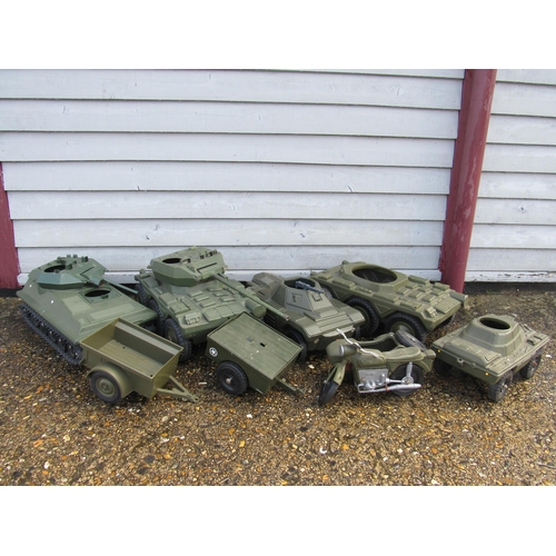 7211 - A collection of vintage playworn plastic military vehicles to suit Action Man figures, including Che... 