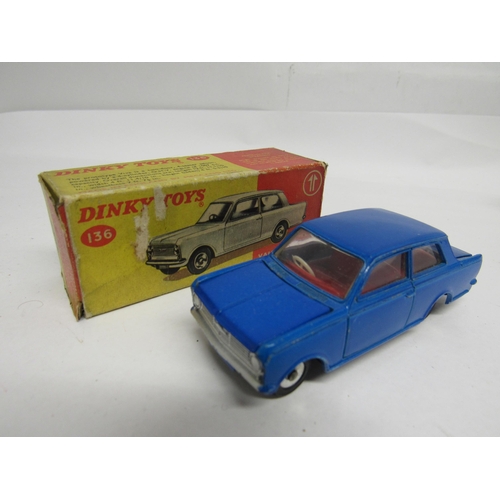 7270 - Five Dinky Toys diecast model cars, housed in yellow and red pictorial card boxes, to include 134 Tr... 