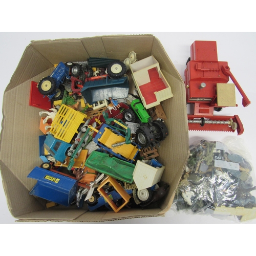 7256 - A collection of predominantly Britains playworn diecast farm vehicles, agricultural implements, plas... 