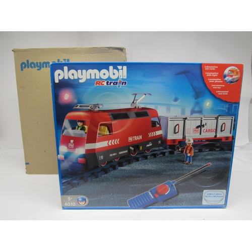 7353 - A boxed Playmobil 4010 G scale RC Train set, comprising locomotive and wagon in red and grey PM trai... 