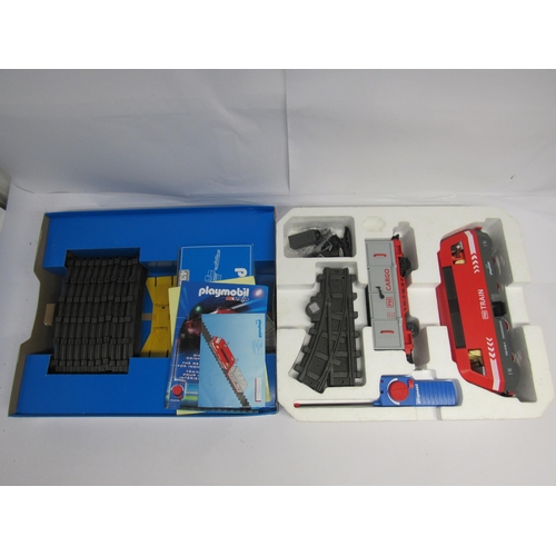 7353 - A boxed Playmobil 4010 G scale RC Train set, comprising locomotive and wagon in red and grey PM trai... 