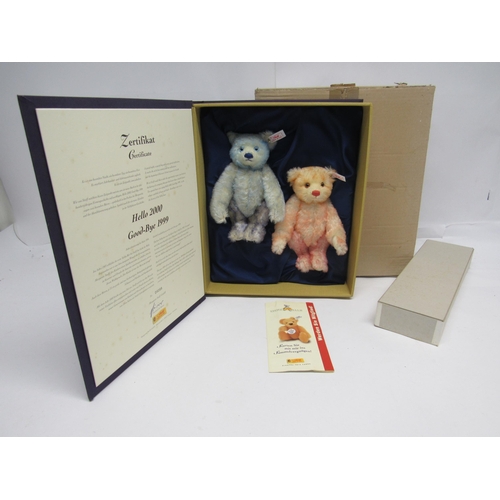 7102 - A boxed Steiff limited edition 67037 Hello 2000 Goodbye 1999 teddy bear set, comprising two blue and... 