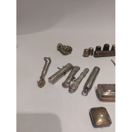 4330A - A collection of silver, 925 and white metal; thimbles, needle cases, button hooks, etc.