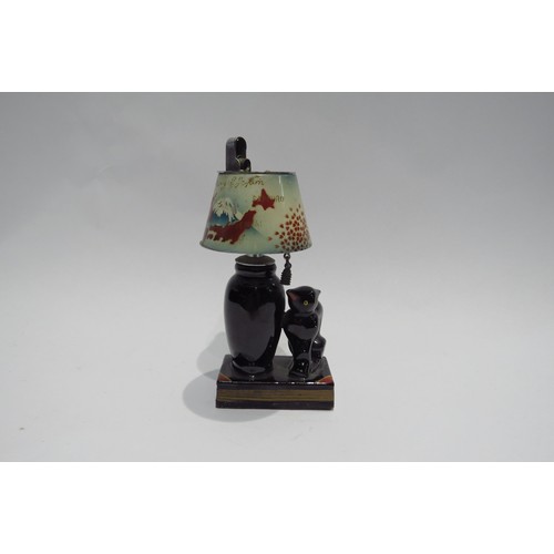 4315 - A 20th Century ceramic Japanese table lighter in the form of a cat and vase together with a selectio... 