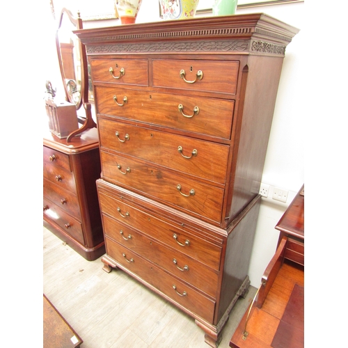 1068 - A Georgian mahogany chest on chest, blind fret cornice, two short over three long drawers, brushing ... 