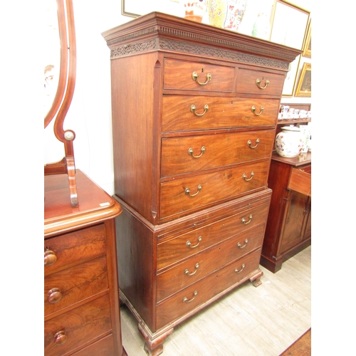 1068 - A Georgian mahogany chest on chest, blind fret cornice, two short over three long drawers, brushing ... 