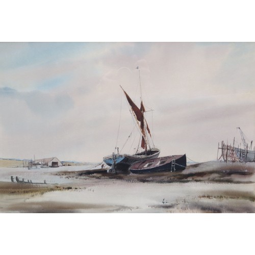 1069 - LESLIE L. HARDY MOORE (1807-1997) : A framed & glazed watercolour, Broads scene, boats on the mudfla... 