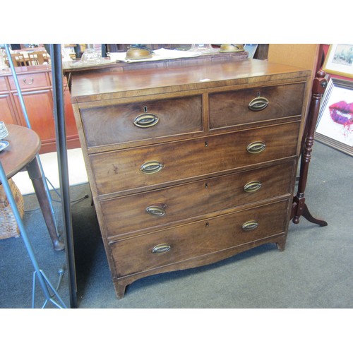 1072 - An early Victorian mahogany chest of two short over three long drawers, brass oval handles, 100cm ta... 