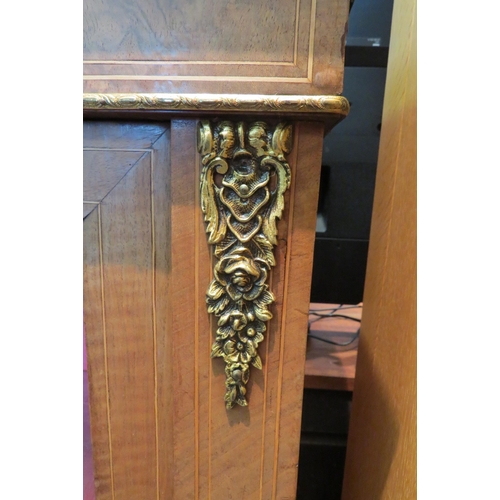 1079 - A Victorian walnut pier cabinet with ormolu mounts, 103cm tall x 79cm wide x 29cm deep