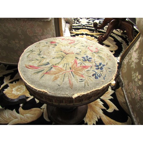 1097 - A Victorian mahogany piano stool with needlepoint seat, fluted column to scroll feet