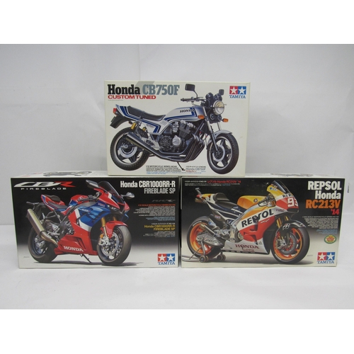 7305 - Three Tamiya Motorcycle Series 1:12 scale Honda motorcycle plastic model kits to include 14066 Honda... 