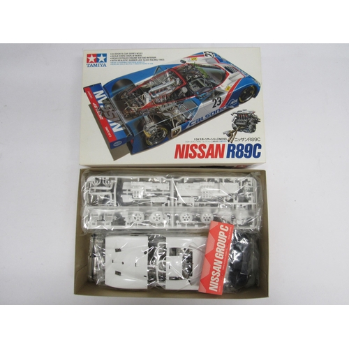 7304 - Five Tamiya 1:24 scale racing car plastic model kits to include 24093 Nissan R89C, 25210 Lancia Stra... 