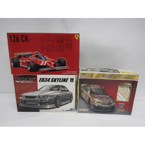 7313 - Three assorted racing and road car plastic model kits to include Fujimi 1:20 scale 091969 Ferrari 12... 