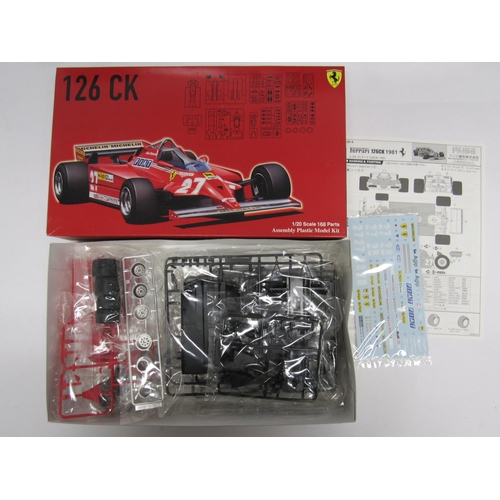 7313 - Three assorted racing and road car plastic model kits to include Fujimi 1:20 scale 091969 Ferrari 12... 