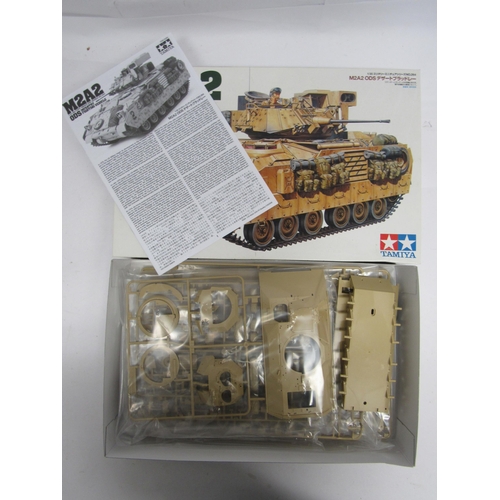 7315 - Four Tamiya Military Miniature Series 1:35 scale plastic model kits to include 35269 M1A2 Abrams Ope... 