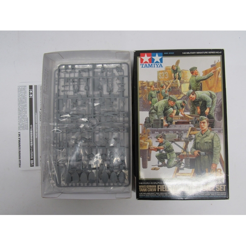 7315 - Four Tamiya Military Miniature Series 1:35 scale plastic model kits to include 35269 M1A2 Abrams Ope... 