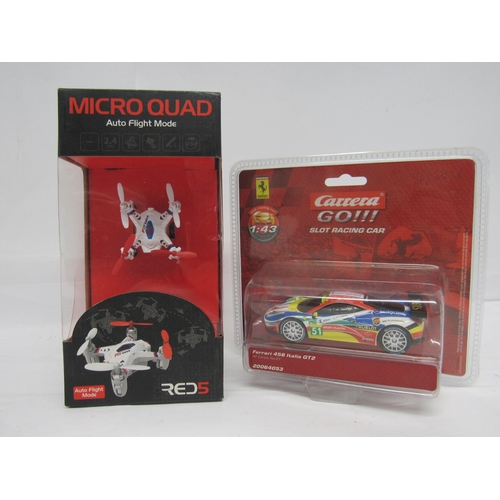 7056 - A boxed Red 5 Micro Quad and a Carrera Go Ferrari 458 Italia GT2 slot racing car (2)