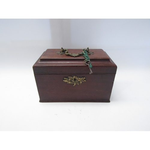 1386 - A Georgian mahogany tea caddy with two original canisters, one missing lid