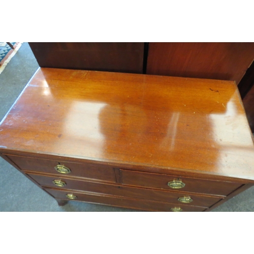 1092 - A 19th Century oak chest of two short over two long drawers, octagonal brass handles, on outswept br... 