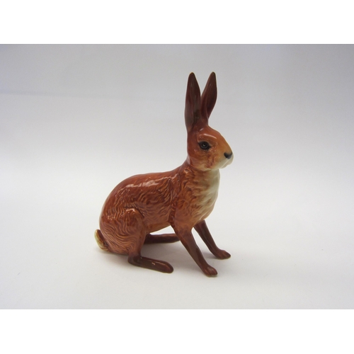 8024 - A Beswick Hare seated in tan, model no. 1025