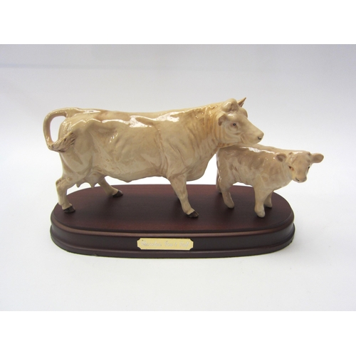 8068 - A Beswick Charolais Cow and Calf on wooden plinth, model no. 3075/1827