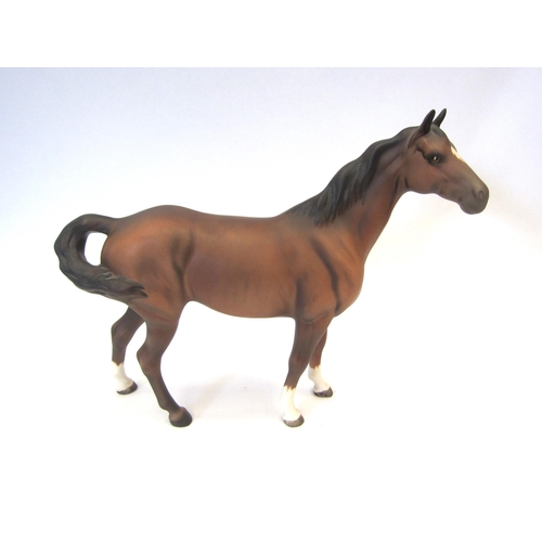 8079 - A Beswick swish tail Horse in brown matt, model no. 1182