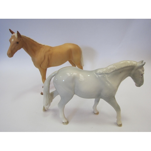 8087 - A Beswick Bois Roussel Racehorse in Palomino matt, model no. 701 together with a John Beswick Pony i... 