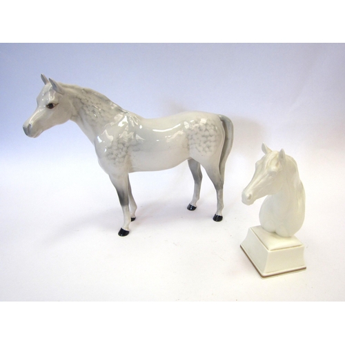 8105 - A Beswick Thoroughbred Stallion in grey gloss, model no. 1992 together with a Royal Doulton Astrope ... 