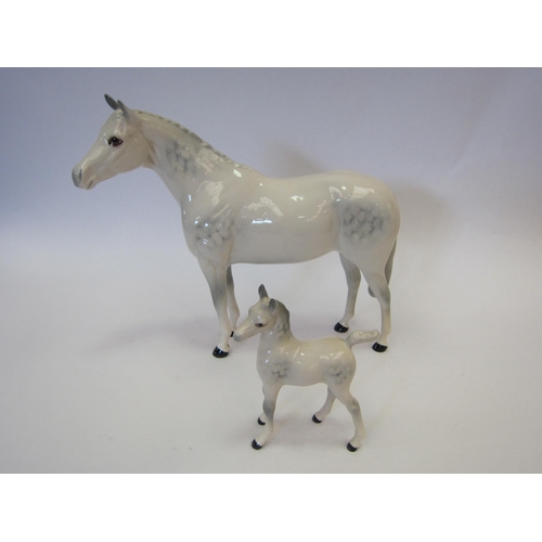 8112 - A Royal Doulton Thoroughbred Stallion in grey gloss, model no. H1772 together with a Royal Doulton A... 